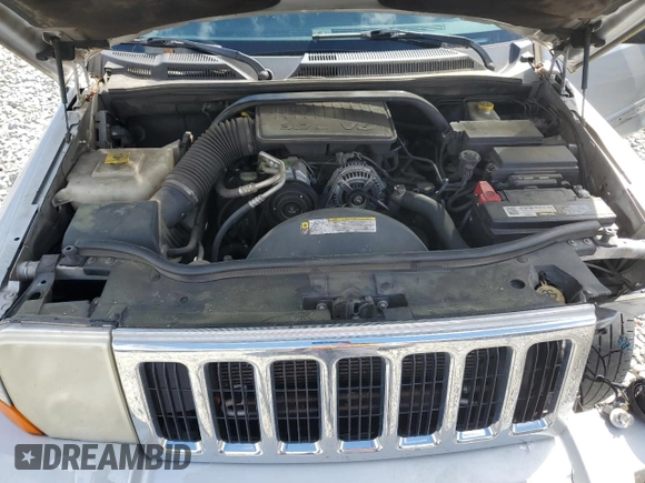 2009 Jeep Commander Sport with VIN 1J8HH48K89C540189, listed as a Copart auction lot 52552235 with 258,377 mi miles and Salvage title. Bid and sale history available at DreamBid. Image 12.