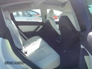 2021 Tesla Model 3 Long Range z VIN 5YJ3E1EB0MF860289, wystawiony jako IAAI lot #41771854 z przebiegiem 190 892 mil mil oraz . Historia ofert i sprzedaży dostępna na DreamBid. Obrazek 8.