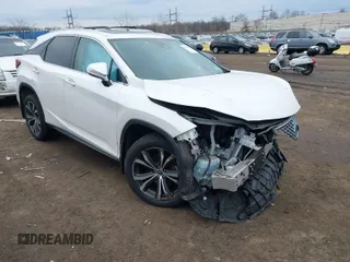 2020 Lexus RX with VIN 2T2HZMDA4LC214613, listed as a IAAI auction lot 41363753 with 26,753 mi miles. Bid and sale history available at carsss.com. Image 1.