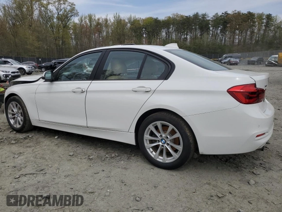 2017 BMW 3 Series 320i xDrive with VIN WBA8E5G5XHNU22436, listed as a Copart auction lot 52702805 with 74,008 mi miles and Salvage title. Bid and sale history available at DreamBid. Image 2.