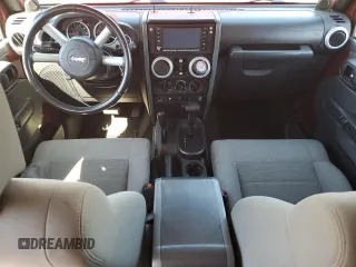 2008 Jeep Wrangler Unlimited Sahara with VIN 1J4GA59168L534967, listed as a Copart auction lot 54894635 with 180,581 mi miles and Salvage title. Bid and sale history available at DreamBid. Image 8.