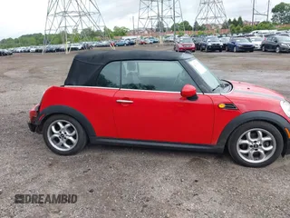 2011 MINI Convertible with VIN WMWZN3C59BTZ89447, listed as a IAAI auction lot 42313009 with 62,009 mi miles and . Bid and sale history available at DreamBid. Image 14.