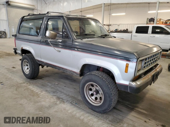 1988 Ford Bronco with VIN 1FMCU14T4JUA54161, listed as a Copart auction lot 76312054 with 34,932 mi miles and Salvage title. Bid and sale history available at DreamBid. Image 4.