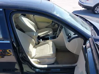 2012 Volkswagen Passat SE w/Sunroof with VIN 1VWBH7A38CC063186, listed as a IAAI auction lot 41700992 with 151,454 mi miles. Bid and sale history available at carsss.com. Image 5.
