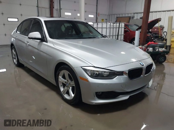 2014 BMW 3 Series 328d xDrive with VIN WBA3D5C55EF147308, listed as a IAAI auction lot 41499435 with 104,941 mi miles. Bid and sale history available at carsss.com. Image 1.