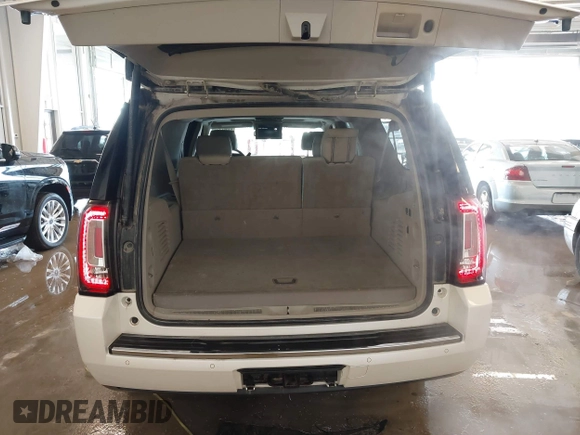 2015 GMC Yukon XL Denali with VIN 1GKS2JKJXFR528927, listed as a IAAI auction lot 41391259 with 159,467 mi miles. Bid and sale history available at carsss.com. Image 17.