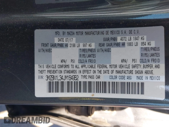 2018 Mazda 3 Touring with VIN 3MZBN1L34JM164952, listed as a IAAI auction lot 42179420 with 106,706 mi miles and . Bid and sale history available at DreamBid. Image 9.