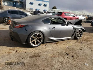 2023 Toyota GR86 with VIN JF1ZNBC19P8751513, listed as a Copart auction lot 43288945 with 19,673 mi miles and Salvage Title. Bid and sale history available at carsss.com. Image 3.