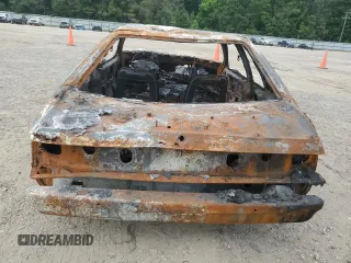 1987 Ford Mustang with VIN 1FABP41A5HF135072, listed as a Copart auction lot 57586605 with Not provided miles and Salvage title. Bid and sale history available at DreamBid. Image 6.