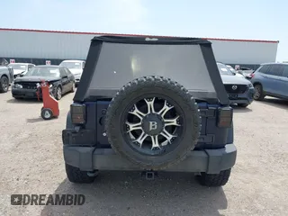 2013 Jeep Wrangler Unlimited Sport with VIN 1C4BJWDGXDL564226, listed as a IAAI auction lot 42042448 with 99,939 mi miles. Bid and sale history available at carsss.com. Image 16.