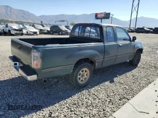 1995 Toyota T100 DX z VIN JT4VD12E0S0005758, wystawiony jako Copart lot #74018364 z przebiegiem 394 656 mil mil oraz Szkody całkowita. Historia ofert i sprzedaży dostępna na DreamBid. Obrazek 3.