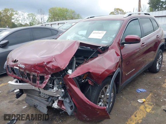 2019 Jeep Cherokee Latitude Plus with VIN 1C4PJLLB9KD434990, listed as a IAAI auction lot 41959477 with 96,283 mi miles and . Bid and sale history available at DreamBid. Image 2.