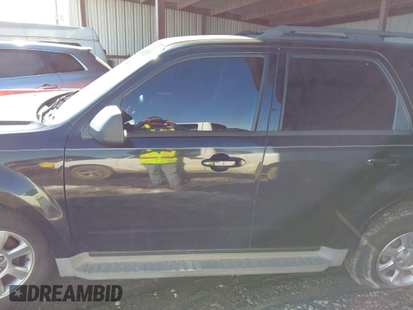 2011 Mazda Tribute Sport with VIN 4F2CY9C7XBKM06202, listed as a IAAI auction lot 41281197 with 195,443 mi miles and . Bid and sale history available at DreamBid. Image 13.