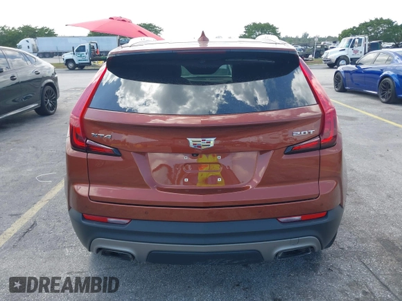 2019 Cadillac XT4 FWD Premium Luxury z VIN 1GYFZCR41KF183507, wystawiony jako IAAI lot #41987176 z przebiegiem 64 803 mil mil oraz . Historia ofert i sprzedaży dostępna na DreamBid. Obrazek 16.