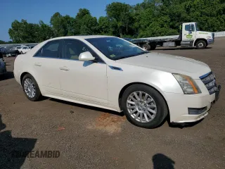 2010 Cadillac CTS Luxury with VIN 1G6DG5EG9A0135210, listed as a Copart auction lot 62516595 with 203,721 mi miles and Salvage title. Bid and sale history available at DreamBid. Image 4.