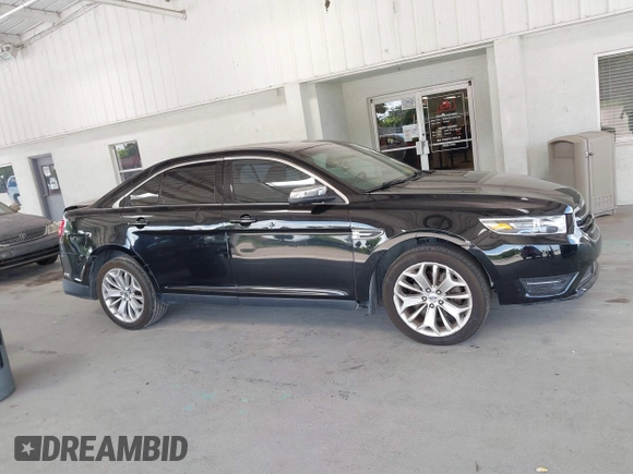 2017 Ford Taurus Limited z VIN 1FAHP2F81HG102598, wystawiony jako IAAI lot #42471410 z przebiegiem 165 386 mil mil oraz . Historia ofert i sprzedaży dostępna na DreamBid. Obrazek 14.
