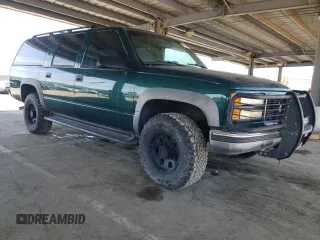 1999 GMC Suburban with VIN 3GKGK26J4XG508566, listed as a Copart auction lot 50612775 with 102,824 mi miles and Clean Title. Bid and sale history available at carsss.com. Image 4.