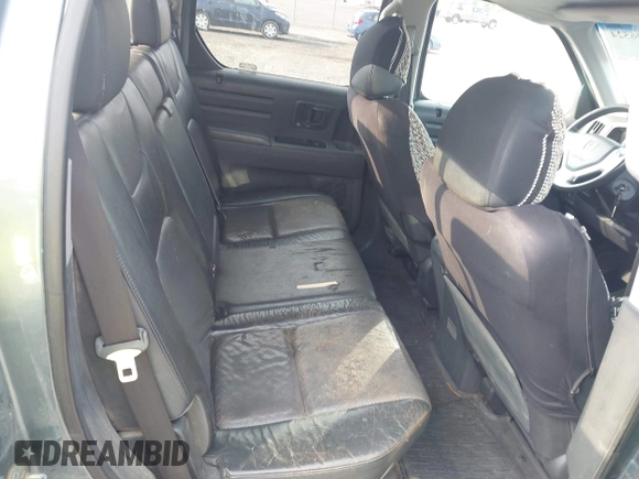 2006 Honda Ridgeline RTL with VIN 2HJYK16526H531884, listed as a IAAI auction lot 42796524 with 334,489 mi miles and . Bid and sale history available at DreamBid. Image 8.
