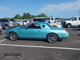 2002 Ford Thunderbird Hardtop Premium z VIN 1FAHP60AX2Y118061, wystawiony jako IAAI lot #42332263 z przebiegiem 162 591 mil mil oraz . Historia ofert i sprzedaży dostępna na DreamBid. Obrazek 14.