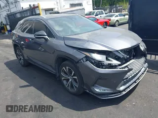 2022 Lexus RX with VIN 2T2HZMAAXNC228510, listed as a IAAI auction lot 41879028 with 87,595 mi miles. Bid and sale history available at carsss.com. Image 1.