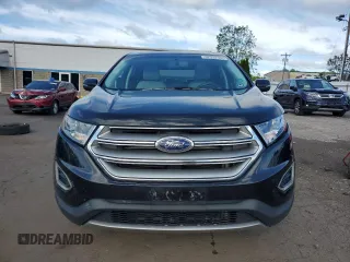 2015 Ford Edge Titanium z VIN 2FMTK4K86FBB88124, wystawiony jako Copart lot #57392305 z przebiegiem 95 698 mil mil oraz Szkoda całkowita • Salvage title. Historia ofert i sprzedaży dostępna na DreamBid. Obrazek 5.
