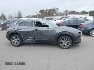2022 Mazda CX-30 S Premium with VIN 3MVDMBDL9NM434619, listed as a IAAI auction lot 41620655 with 46,557 mi miles and . Bid and sale history available at carsss.com. Image 13.