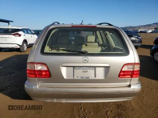 2000 Mercedes-Benz E-Class with VIN WDBJH65J6YB012332, listed as a Copart auction lot 80918284 with 186,616 mi miles and Clean Title. Bid and sale history available at carsss.com. Image 6.