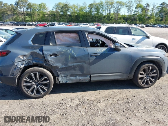 2023 Mazda CX-50 S Premium Plus with VIN 7MMVABEM8PN108020, listed as a IAAI auction lot 42203568 with 26,783 mi miles and . Bid and sale history available at DreamBid. Image 13.
