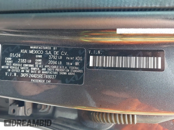 2024 Kia Forte LXS with VIN 3KPF24AD5RE749037, listed as a IAAI auction lot 42113745 with 51,486 mi miles and . Bid and sale history available at DreamBid. Image 9.