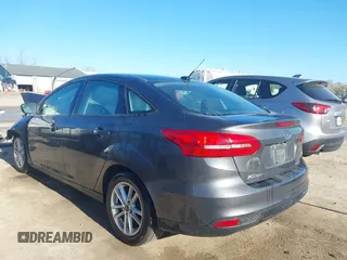 2016 Ford Focus SE with VIN 1FADP3F26GL233564, listed as a IAAI auction lot 42083597 with 153,404 mi miles and . Bid and sale history available at DreamBid. Image 3.