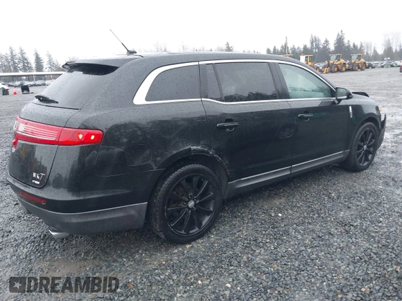 2010 Lincoln MKT EcoBoost with VIN 2LMHJ5AT7ABJ04443, listed as a IAAI auction lot 41657143 with 112,902 mi miles and . Bid and sale history available at DreamBid. Image 4.