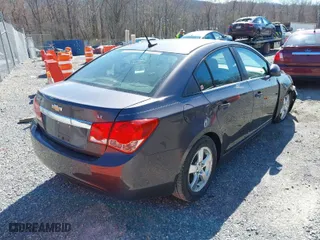 2011 Chevrolet Cruze LT w/1LT with VIN 1G1PF5S93B7232343, listed as a IAAI auction lot 41893866 with 128,819 mi miles. Bid and sale history available at carsss.com. Image 4.