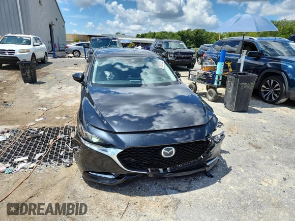 2022 Mazda 3 2.5 Turbo z VIN 3MZBPBAY9NM305244, wystawiony jako Copart lot #63661025 z przebiegiem 89 066 mil mil oraz Czysty tytuł • Clean title. Historia ofert i sprzedaży dostępna na DreamBid. Obrazek 5.