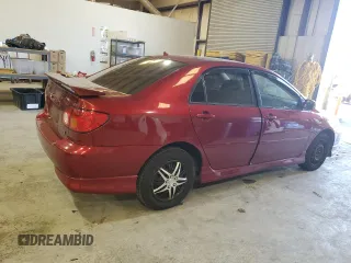 2003 Toyota Corolla CE with VIN 1NXBR32E63Z161048, listed as a Copart auction lot 83226694 with 299,999 mi miles and Salvage Title. Bid and sale history available at carsss.com. Image 3.