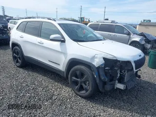 2019 Jeep Cherokee Latitude Plus with VIN 1C4PJMLX2KD432659, listed as a IAAI auction lot 42011291 with 76,015 mi miles. Bid and sale history available at carsss.com. Image 1.