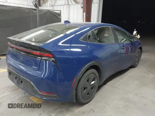 2024 Toyota Prius LE with VIN JTDACAAU0R3030582, listed as a IAAI auction lot 41838615 with 9,402 mi miles and . Bid and sale history available at DreamBid. Image 4.