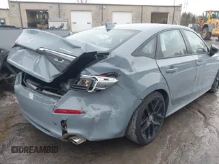 2023 Honda Civic Sport z VIN 2HGFE2F56PH567170, wystawiony jako IAAI lot #41700433 z przebiegiem 38 877 mil mil oraz . Historia ofert i sprzedaży dostępna na DreamBid. Obrazek 6.