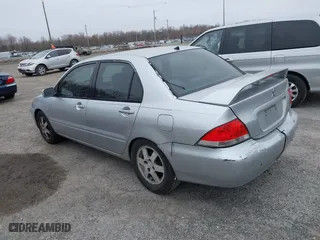 2004 Mitsubishi Lancer LS with VIN JA3AJ36E44U020349, listed as a IAAI auction lot 41714325 with 1 mi miles. Bid and sale history available at carsss.com. Image 3.