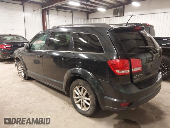 2013 Dodge Journey SXT with VIN 3C4PDDBGXDT571489, listed as a IAAI auction lot 42015939 with 206,550 mi miles and . Bid and sale history available at DreamBid. Image 3.