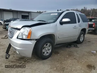 2012 GMC Yukon SLT with VIN 1GKS1CE08CR203822, listed as a Copart auction lot 82955253 with 122,508 mi miles and Salvage Title. Bid and sale history available at carsss.com. Image 1.