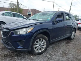 2013 Mazda CX-5 Sport with VIN JM3KE2BE1D0160254, listed as a IAAI auction lot 42256555 with 136,476 mi miles and . Bid and sale history available at DreamBid. Image 17.