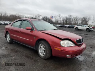 2000 Mercury Sable LS Premium with VIN 1MEFM55S7YA617342, listed as a Copart auction lot 85764394 with 71,628 mi miles and Salvage Title. Bid and sale history available at carsss.com. Image 4.