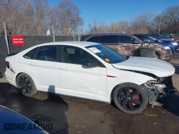2019 Volkswagen Jetta GLI S z VIN 3VW6T7BU7KM236894, wystawiony jako IAAI lot #41499098 z przebiegiem 107 795 mil mil oraz . Historia ofert i sprzedaży dostępna na DreamBid. Obrazek 13.