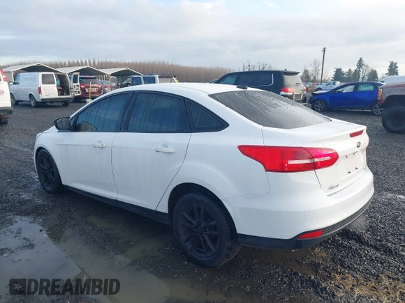 2018 Ford Focus SE with VIN 1FADP3F23JL242066, listed as a IAAI auction lot 41804512 with 99,662 mi miles. Bid and sale history available at carsss.com. Image 3.