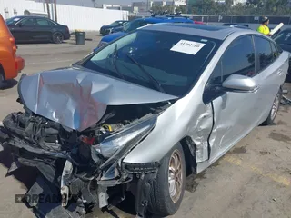 2018 Toyota Prius Two with VIN JTDKARFU2J3554502, listed as a IAAI auction lot 41592780 with 119,210 mi miles. Bid and sale history available at carsss.com. Image 6.