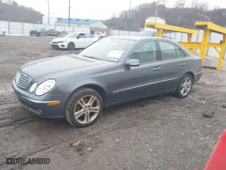 2006 Mercedes-Benz E-Class 3.5L with VIN WDBUF87J26X207923, listed as a IAAI auction lot 41479006 with 154,024 mi miles. Bid and sale history available at carsss.com. Image 2.