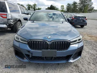 2023 BMW 5 Series M550i xDrive z VIN WBA13BK02PCN82953, wystawiony jako Copart lot #68124264 z przebiegiem 10 010 mil mil oraz Szkoda całkowita • Salvage title. Historia ofert i sprzedaży dostępna na DreamBid. Obrazek 5.