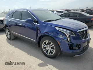 2023 Cadillac XT5 FWD Premium Luxury with VIN 1GYKNCRS3PZ154122, listed as a Copart auction lot 53667425 with 52,279 mi miles and Salvage Title. Bid and sale history available at carsss.com. Image 4.