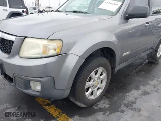2008 Mazda Tribute Sport with VIN 4F2CZ02Z28KM31700, listed as a IAAI auction lot 41736309 with 235,848 mi miles. Bid and sale history available at carsss.com. Image 6.