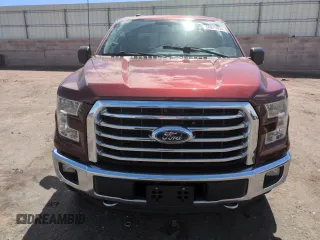 2016 Ford F-150 XLT with VIN 1FTEW1EG2GKD88539, listed as a Copart auction lot 56975835 with 142,775 mi miles and Salvage title. Bid and sale history available at DreamBid. Image 5.